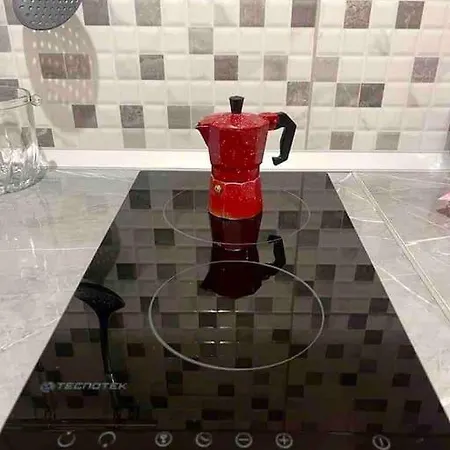 In Апартаменты Тирана